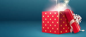 Ein geГ¶ffnetes rotes Geschenkpaket.