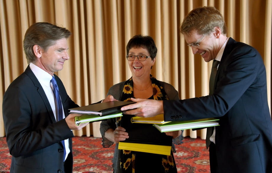 Heiner Garg (FDP), Monika Heinold (Bündnis 90/Die Grünen) und Daniel Günther (CDU)